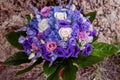 Beautiful bouquet with purple tones, exquisite floral arrangement, centerpiece or a bridal accessory inspiration Royalty Free Stock Photo