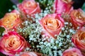 Beautiful bouquet of roses close-up . Pink and yellow mixed Rose, beautiful nature background . Artificial roses on table,Love Royalty Free Stock Photo