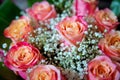 Beautiful bouquet of roses close-up . Pink and yellow mixed Rose, beautiful nature background . Artificial roses on table,Love Royalty Free Stock Photo