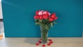 Beautiful bouquet of roses in jars on table with a beautiful background. Wedding bouquet of red rose