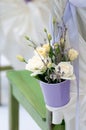 Beautiful bouquet of roses and lavender in bucke