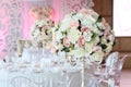 Beautiful bouquet of roses in wedding decor restaurant