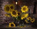 Beautiful bouquet of sunflowers in vase on a wooden table Royalty Free Stock Photo