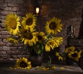 Beautiful bouquet of sunflowers in vase on a wooden table Royalty Free Stock Photo