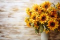 Beautiful bouquet of sunflowers in a vase on a wooden table top background, floral autumn template flat lay with copy space Royalty Free Stock Photo