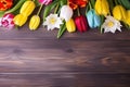 Beautiful bouquet of Tulips Daisies flower for mothers day on wood table background, Overhead top view, flat lay with copy space