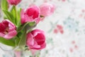 Beautiful bouquet of tulips. Glass vase. Pink tulips. Postcard.