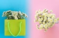 A beautiful bouquet of white chrysanthemum flowers in a bright paper bag packaging The view from the top of the gradient backgroun Royalty Free Stock Photo