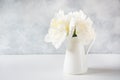 Beautiful bouquet of white peony flowers in vase. Copy space. Royalty Free Stock Photo