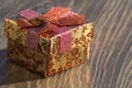 A beautiful box tied with ribbons. Holiday gift