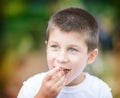 Beautiful boy eating Royalty Free Stock Photo