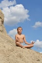 Beautiful boy on the sand