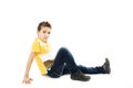 Beautiful boy sitting on floor Royalty Free Stock Photo