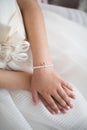 A beautiful bracelet on the child`s hand of a girl