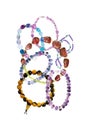 Beautiful bracelets with precious stones isolated on white