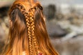 Beautiful braid hairstyle on redhead woman