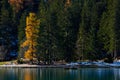 The beautiful Braies lake in late autumn with a little snow, Pearl of the Dolomite lakes is an UNESCO heritage and is located in