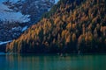 The beautiful Braies lake in late autumn with a little snow, Pearl of the Dolomite lakes is an UNESCO heritage and is located in