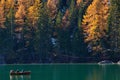 The beautiful Braies lake in late autumn with a little snow, Pearl of the Dolomite lakes is an UNESCO heritage and is located in