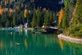 The beautiful Braies lake in late autumn with a little snow, Pearl of the Dolomite lakes is an UNESCO heritage and is located in