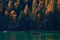 The beautiful Braies lake in late autumn with a little snow, Pearl of the Dolomite lakes is an UNESCO heritage and is located in