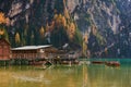 The beautiful Braies lake in late autumn with a little snow, Pearl of the Dolomite lakes is an UNESCO heritage and is located in