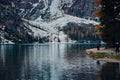 The beautiful Braies lake in late autumn with a little snow, Pearl of the Dolomite lakes is an UNESCO heritage and is located in