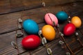 Beautiful branch of willow and easter eggs wood background Royalty Free Stock Photo