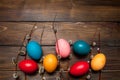Beautiful branch of willow and easter eggs wood background Royalty Free Stock Photo