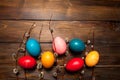Beautiful branch of willow and easter eggs wood background Royalty Free Stock Photo