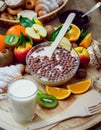 Beautiful breakfast. Milk fruits, bread and croissant.