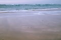 Beautiful breaking waves on sandy beach on atlantic ocean, basque country, france Royalty Free Stock Photo