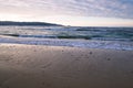 Beautiful breaking waves on sandy beach on atlantic ocean, basque country, france Royalty Free Stock Photo