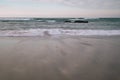 Beautiful breaking waves on sandy beach on atlantic ocean, hendaye, basque country, france Royalty Free Stock Photo