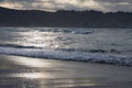 Beautiful breaking waves on sandy beach on atlantic ocean in sunset, hendaye, basque country, france Royalty Free Stock Photo