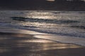 Beautiful breaking waves on sandy beach on atlantic ocean in sunset, hendaye, basque country, france Royalty Free Stock Photo