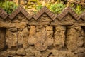 Beautiful brick fence near the house-museum in the Park Guell in Barcelona. Old architecture concept Royalty Free Stock Photo