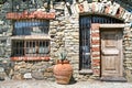 Beautiful brick house with flowers, door and window, cinque terre, liguria, italy Royalty Free Stock Photo