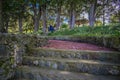 Beautiful brick sidewalk with stones in porilklas and stepped path