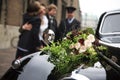 Beautiful bridal bouquet on car bonnet Royalty Free Stock Photo