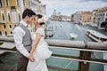 Beautiful bridal couple at sunset on the streets of Venice Royalty Free Stock Photo