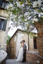 Beautiful bridal couple at sunset on the streets of Venice Royalty Free Stock Photo