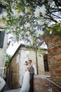 Beautiful bridal couple at sunset on the streets of Venice Royalty Free Stock Photo