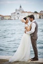 Beautiful bridal couple at sunset on the streets of Venice Royalty Free Stock Photo