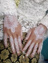 so beautiful a bride in a beautiful white dress and white henna Royalty Free Stock Photo