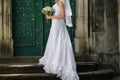 Beautiful bride with big wedding bouquet