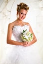 Beautiful bride with bouquet of flowers Royalty Free Stock Photo