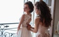 Beautiful bride and bridesmaids in luxury dresses.