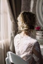 Beautiful bride with fashion wedding hairstyle - on white background Royalty Free Stock Photo