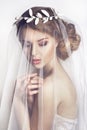 Beautiful bride with fashion wedding hairstyle - on white background Royalty Free Stock Photo